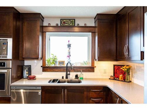 1115 10 Street Se, Calgary, AB - Indoor Photo Showing Kitchen With Double Sink