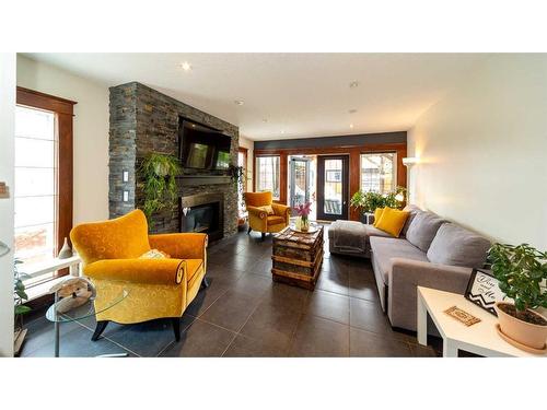 1115 10 Street Se, Calgary, AB - Indoor Photo Showing Living Room With Fireplace