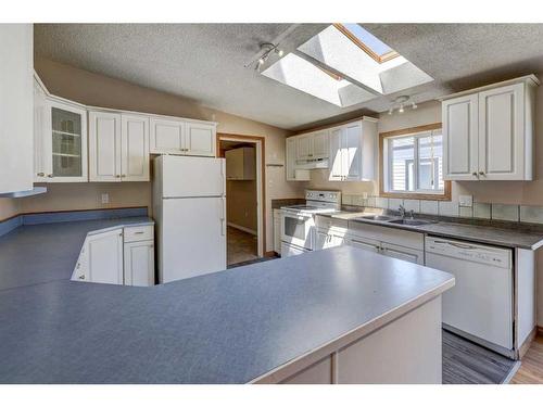 543 Pioneer Drive, Irricana, AB - Indoor Photo Showing Kitchen With Double Sink