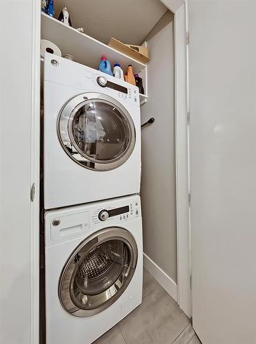 208-1521 26 Avenue Sw, Calgary, AB - Indoor Photo Showing Laundry Room