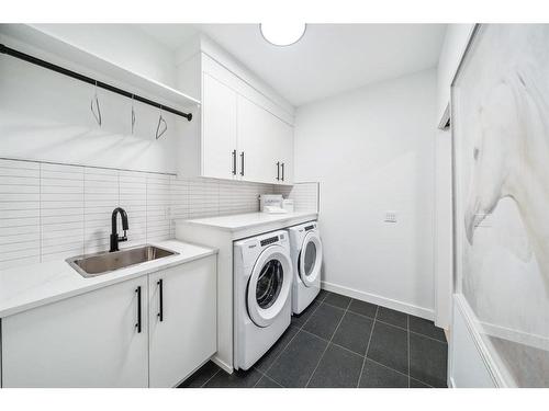 29 Timberline Court Sw, Calgary, AB - Indoor Photo Showing Laundry Room