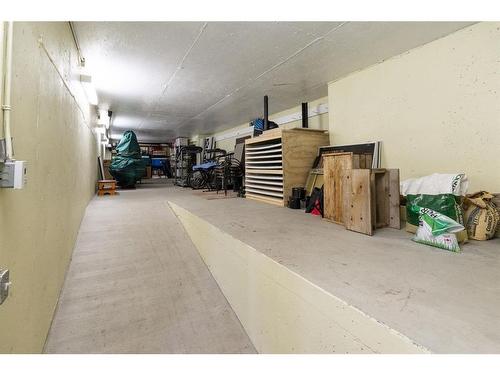 309 Wild Rose Close, Rural Rocky View County, AB - Indoor Photo Showing Garage