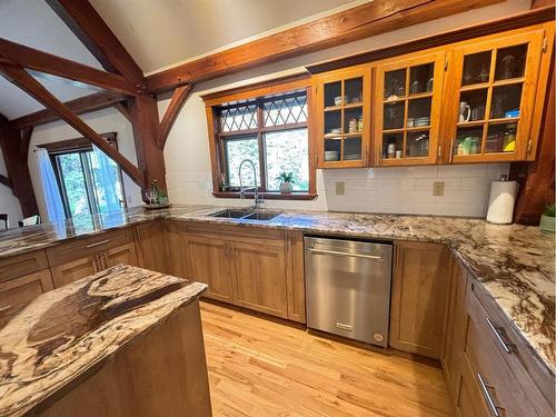 83 Manyhorses Drive, Rural Rocky View County, AB - Indoor Photo Showing Kitchen With Double Sink