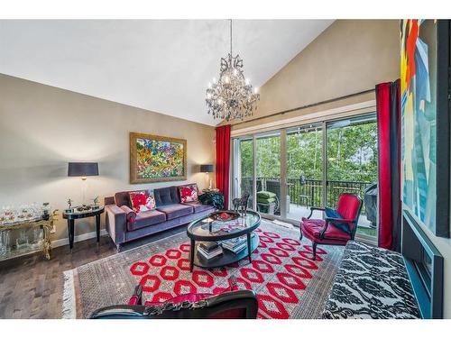 23 Cortina Villas Sw, Calgary, AB - Indoor Photo Showing Living Room