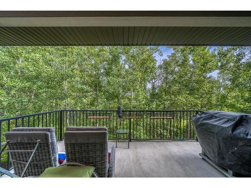 23 Cortina Villas Sw, Calgary, AB - Outdoor With Deck Patio Veranda