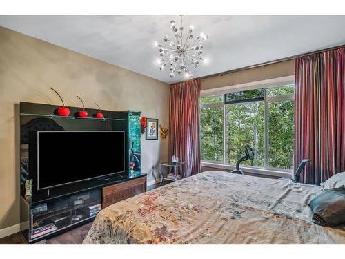 23 Cortina Villas Sw, Calgary, AB - Indoor Photo Showing Bedroom