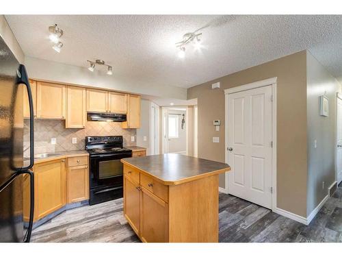 1807-140 Sagewood Boulevard Sw, Airdrie, AB - Indoor Photo Showing Kitchen