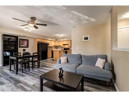 1807-140 Sagewood Boulevard Sw, Airdrie, AB - Indoor Photo Showing Living Room