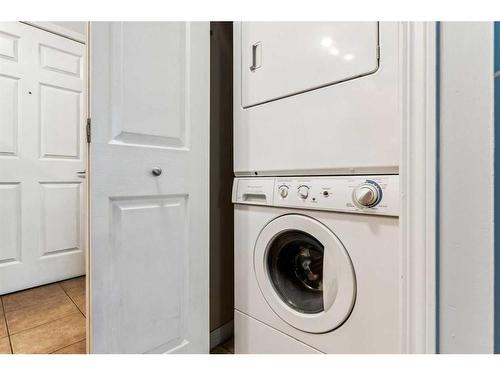 103-5720 2 Street Sw, Calgary, AB - Indoor Photo Showing Laundry Room