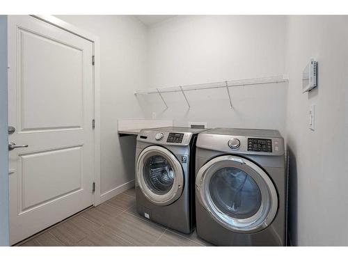 14 Sage Meadows Way Nw, Calgary, AB - Indoor Photo Showing Laundry Room