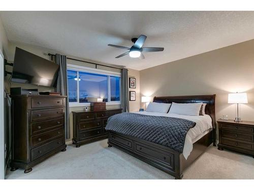233 Kingsmere Cove Se, Airdrie, AB - Indoor Photo Showing Bedroom