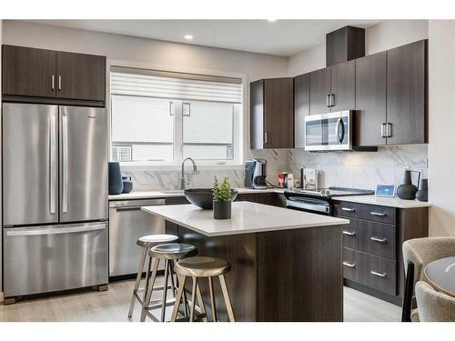 16 Amblefield View Nw, Calgary, AB - Indoor Photo Showing Kitchen With Stainless Steel Kitchen With Upgraded Kitchen