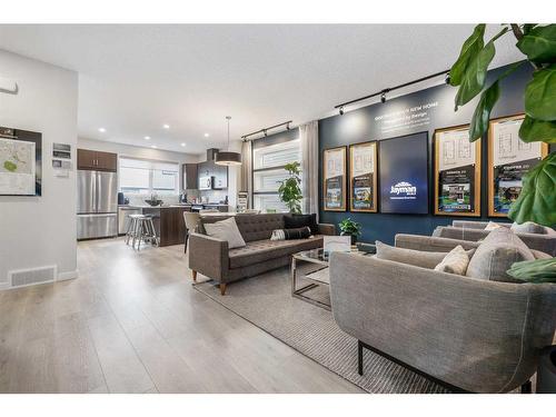 16 Amblefield View Nw, Calgary, AB - Indoor Photo Showing Living Room