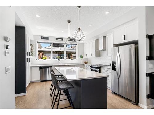 154 Magnolia Square Se, Calgary, AB - Indoor Photo Showing Kitchen With Stainless Steel Kitchen With Upgraded Kitchen
