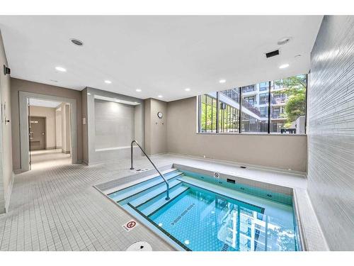 1208-128 2 Street Sw, Calgary, AB - Indoor Photo Showing Other Room With In Ground Pool