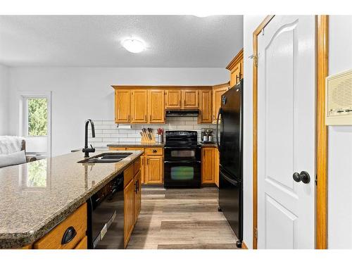 179 Mckenzie Lake Cove, Calgary, AB - Indoor Photo Showing Kitchen With Double Sink