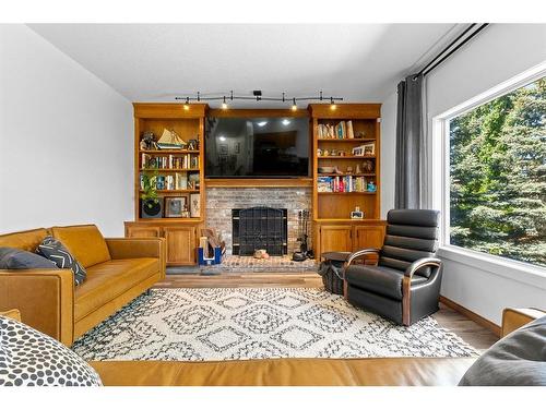 179 Mckenzie Lake Cove, Calgary, AB - Indoor Photo Showing Living Room With Fireplace