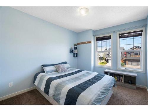 325 Kings Heights Drive Se, Airdrie, AB - Indoor Photo Showing Bedroom