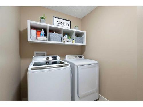 325 Kings Heights Drive Se, Airdrie, AB - Indoor Photo Showing Laundry Room