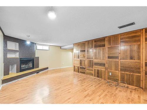 1791 66 Avenue Se, Calgary, AB - Indoor With Fireplace