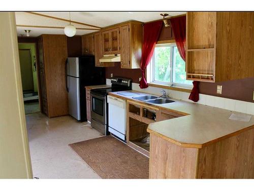 232041 Range Road 240, Rural Wheatland County, AB - Indoor Photo Showing Kitchen With Double Sink