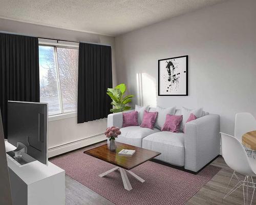 105 First Avenue East, Cochrane, AB - Indoor Photo Showing Living Room