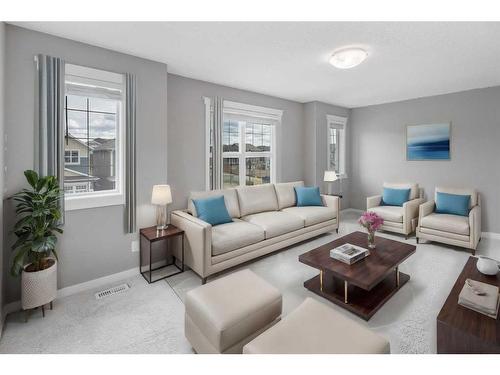 209 Kingsmere Cove Se, Airdrie, AB - Indoor Photo Showing Living Room