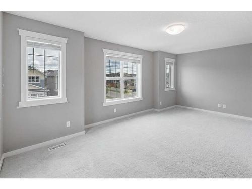 209 Kingsmere Cove Se, Airdrie, AB - Indoor Photo Showing Other Room