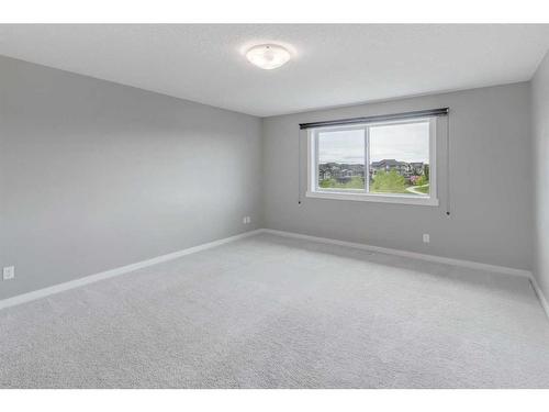 209 Kingsmere Cove Se, Airdrie, AB - Indoor Photo Showing Other Room