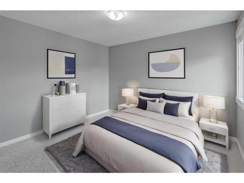 209 Kingsmere Cove Se, Airdrie, AB - Indoor Photo Showing Bedroom