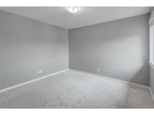 209 Kingsmere Cove Se, Airdrie, AB - Indoor Photo Showing Other Room