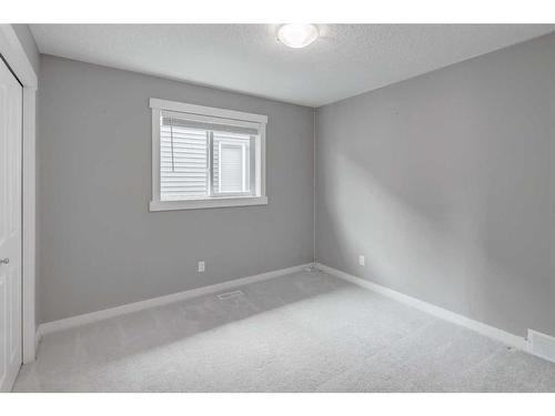 209 Kingsmere Cove Se, Airdrie, AB - Indoor Photo Showing Other Room