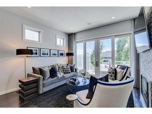 14 Mahogany Passage Se, Calgary, AB - Indoor Photo Showing Living Room With Fireplace