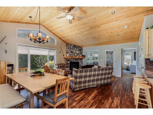 4031-25054 South Pine Lake Road, Rural Red Deer County, AB - Indoor Photo Showing Dining Room With Fireplace