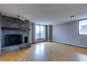 604-215 14 Avenue Sw, Calgary, AB  - Indoor Photo Showing Living Room With Fireplace 