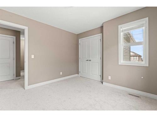 67 Nolancrest Rise Nw, Calgary, AB - Indoor Photo Showing Other Room