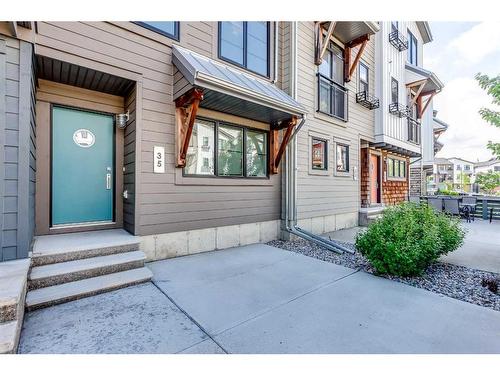 35 Walden Walk Se, Calgary, AB - Outdoor With Balcony With Facade