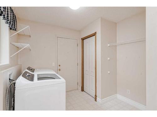 20 Chaparral Drive Se, Calgary, AB - Indoor Photo Showing Laundry Room