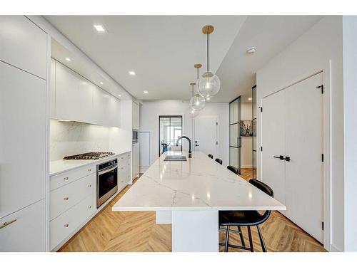 510-8505 Broadcast Avenue Sw, Calgary, AB - Indoor Photo Showing Kitchen With Double Sink With Upgraded Kitchen