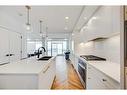 510-8505 Broadcast Avenue Sw, Calgary, AB  - Indoor Photo Showing Kitchen With Double Sink With Upgraded Kitchen 