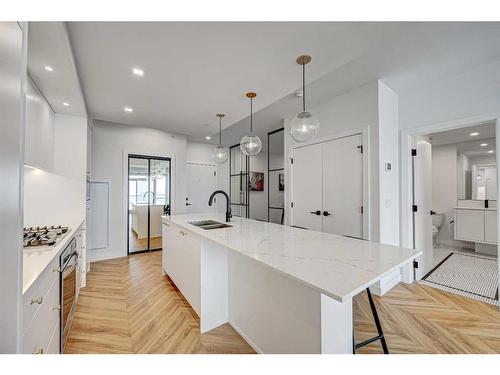 510-8505 Broadcast Avenue Sw, Calgary, AB - Indoor Photo Showing Kitchen With Double Sink With Upgraded Kitchen