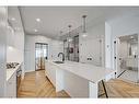 510-8505 Broadcast Avenue Sw, Calgary, AB  - Indoor Photo Showing Kitchen With Double Sink With Upgraded Kitchen 