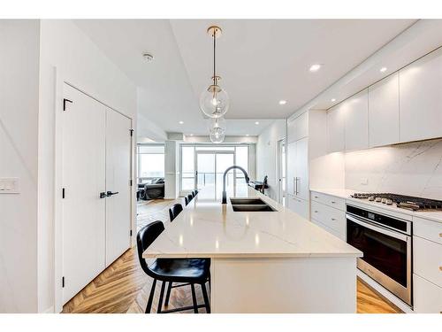 510-8505 Broadcast Avenue Sw, Calgary, AB - Indoor Photo Showing Kitchen With Double Sink With Upgraded Kitchen