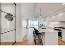 510-8505 Broadcast Avenue Sw, Calgary, AB  - Indoor Photo Showing Kitchen With Double Sink With Upgraded Kitchen 