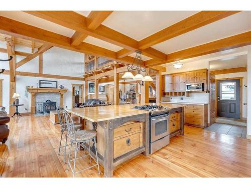 373195 48 Street West, Rural Foothills County, AB - Indoor Photo Showing Other Room With Fireplace