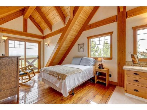 373195 48 Street West, Rural Foothills County, AB - Indoor Photo Showing Bedroom