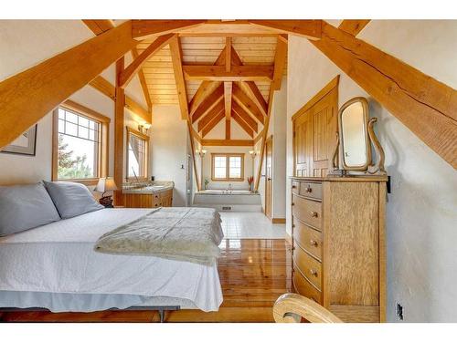 373195 48 Street West, Rural Foothills County, AB - Indoor Photo Showing Bedroom