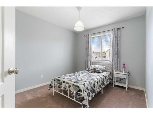 182 Cranberry Close Se, Calgary, AB - Indoor Photo Showing Bedroom