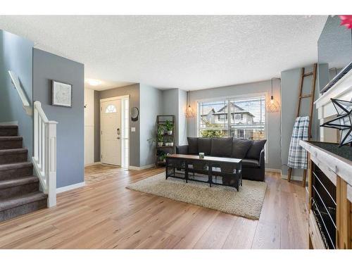 182 Cranberry Close Se, Calgary, AB - Indoor Photo Showing Living Room