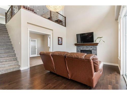 148 Marquis View Se, Calgary, AB - Indoor Photo Showing Other Room With Fireplace